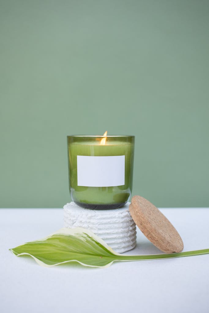 naturally scented candle with a leaf