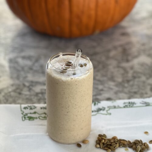 pumpkin smoothie in a clear glass