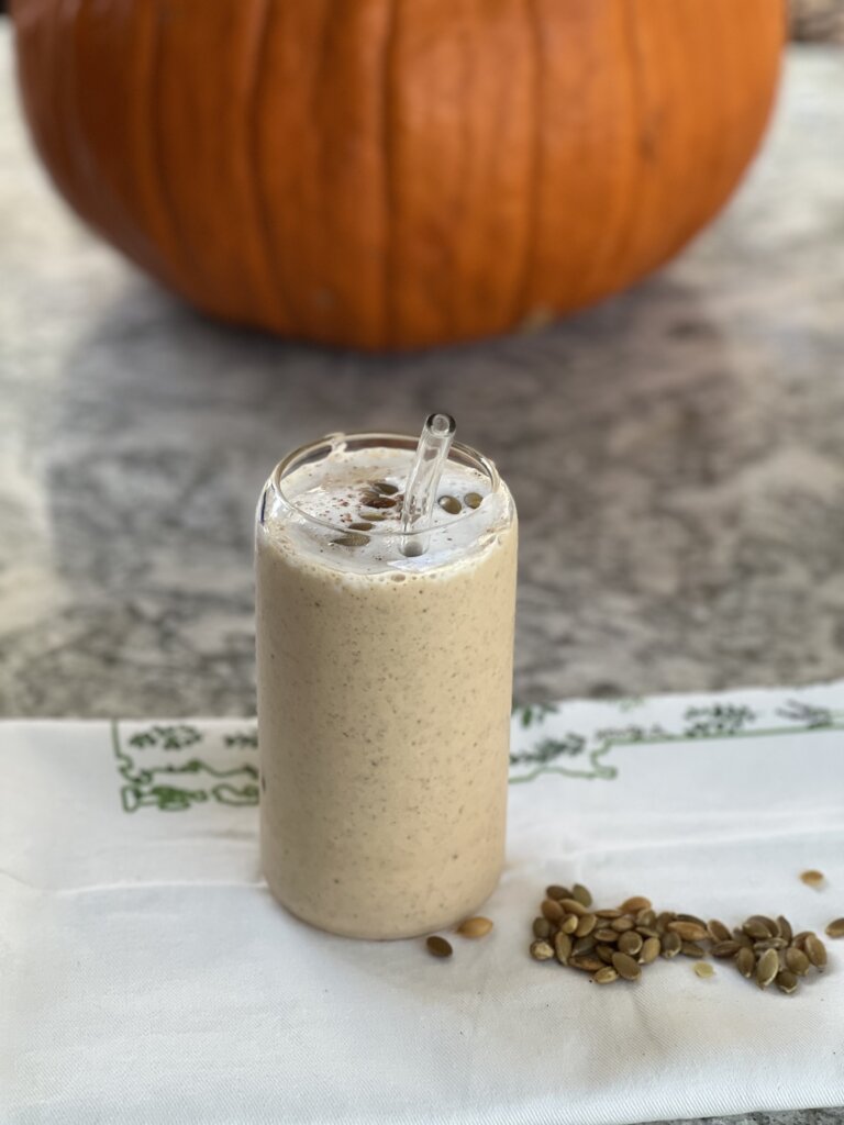 pumpkin smoothie in a clear glass