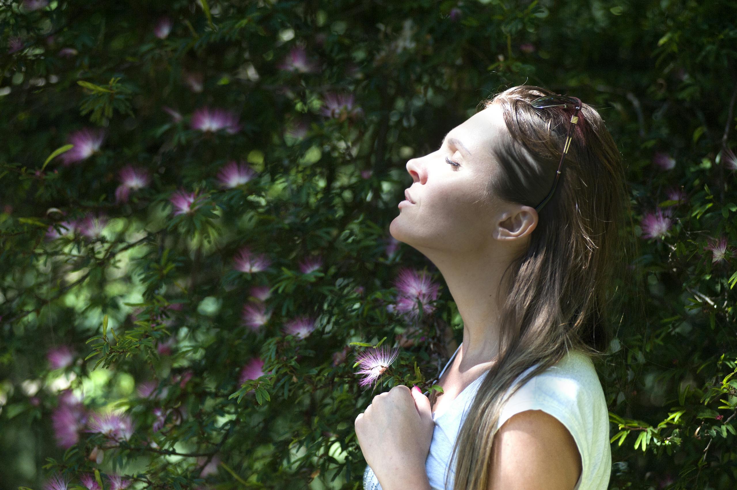 A woman enjoying a serene moment contemplating reclaiming my life